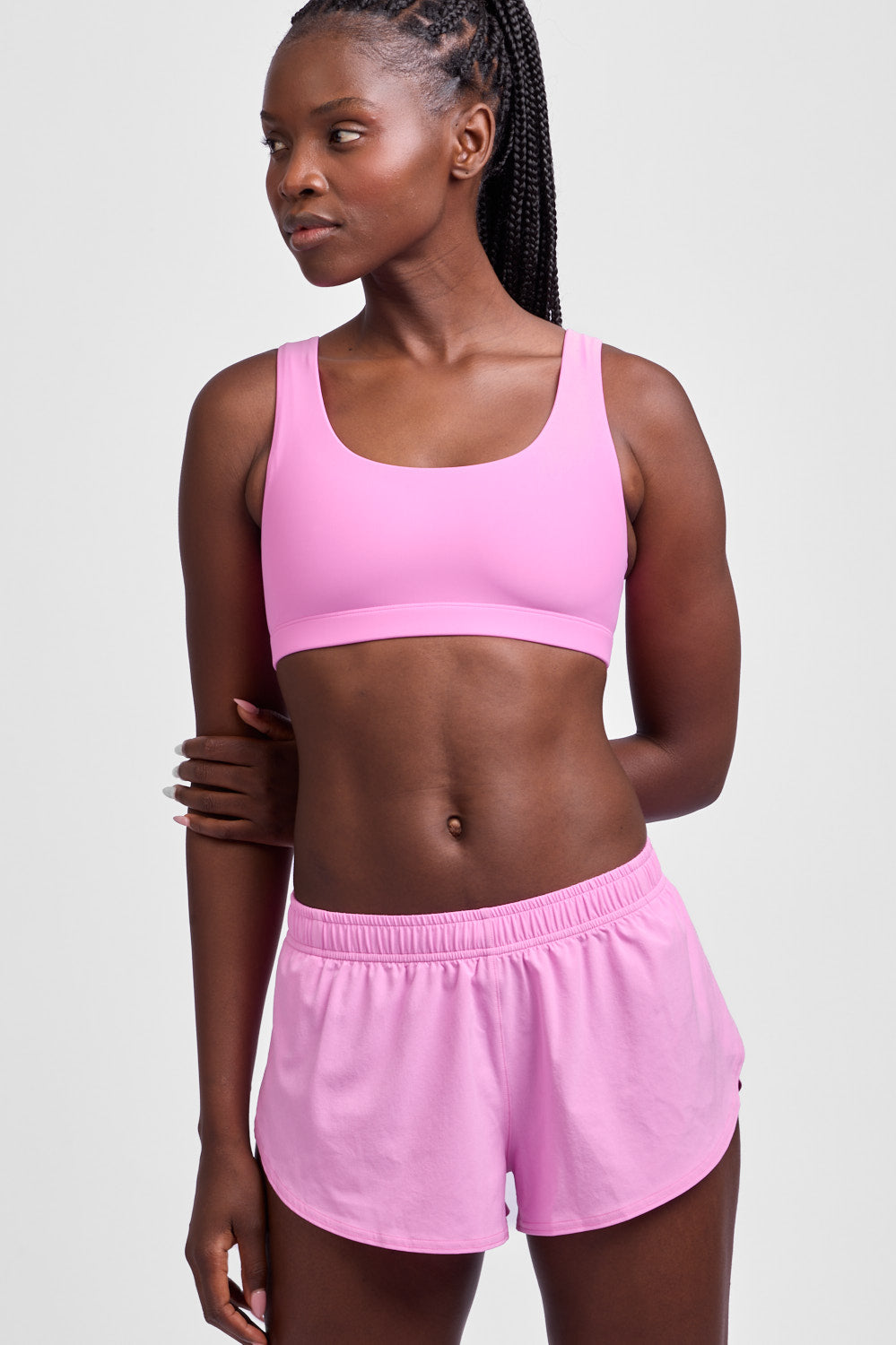 jolyn_womens_activewear-shorts_run_lizzie_pinky_1b-front_grey-studio_pdp_all.jpg