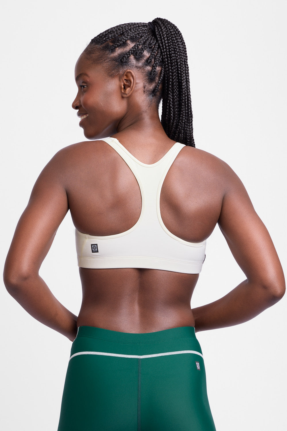 jolyn_womens_sports-bras_run_molly_vanilla_3a-back_grey-studio_pdp_all.jpg